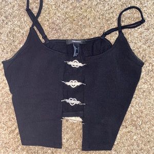 Black tank top crop top w heart shapes in the middle